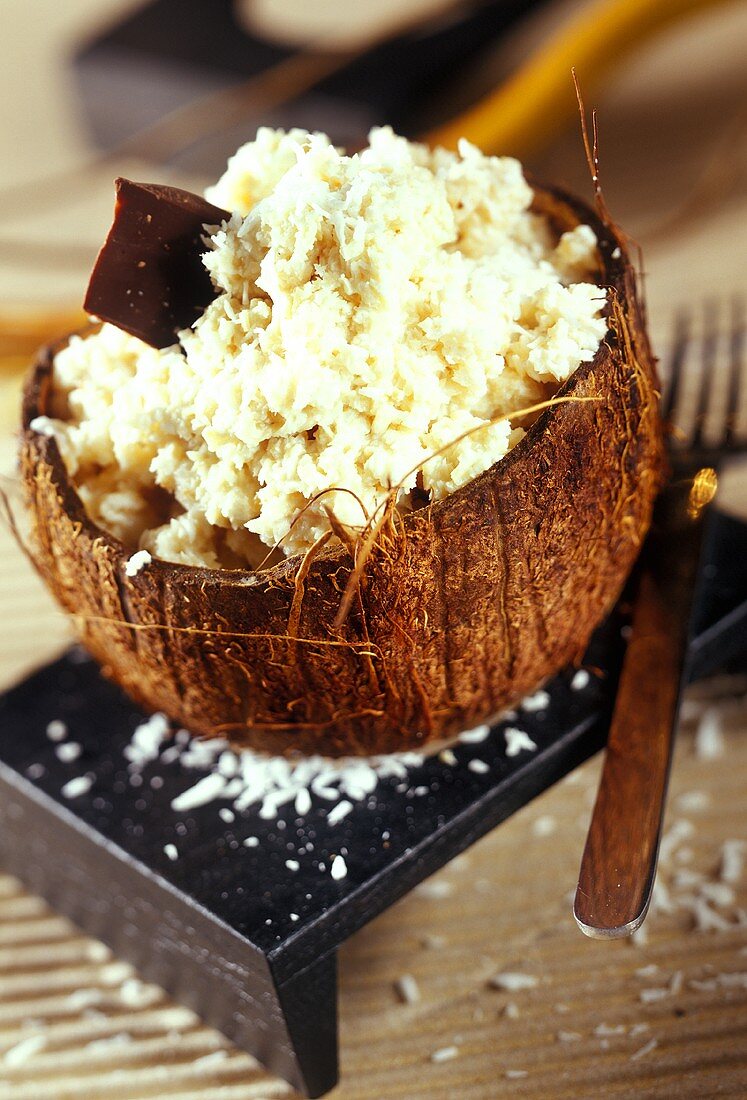 Coconut cream in hollowed-out coconut