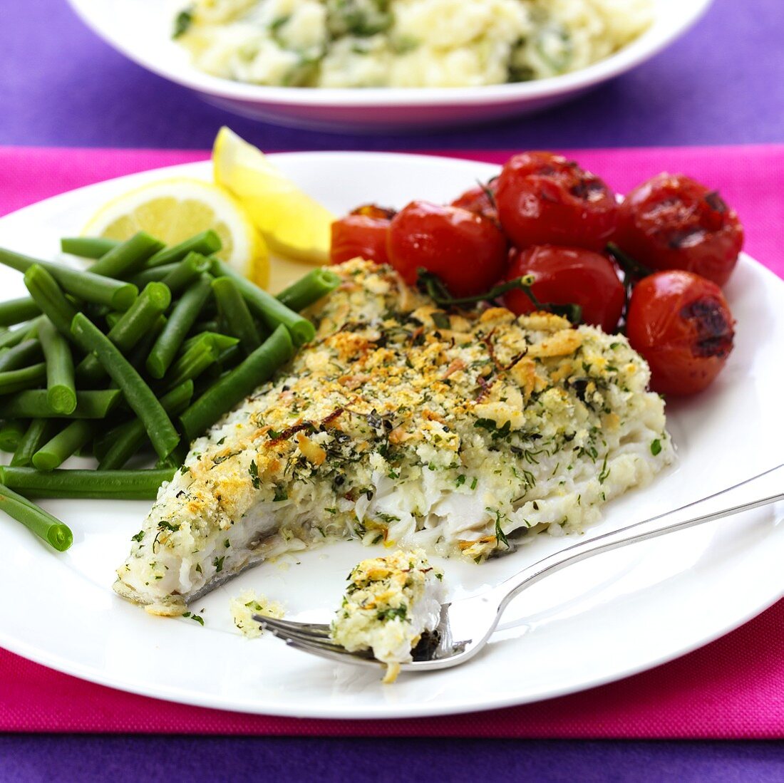Cod with cheese and herb crust, tomatoes and green beans
