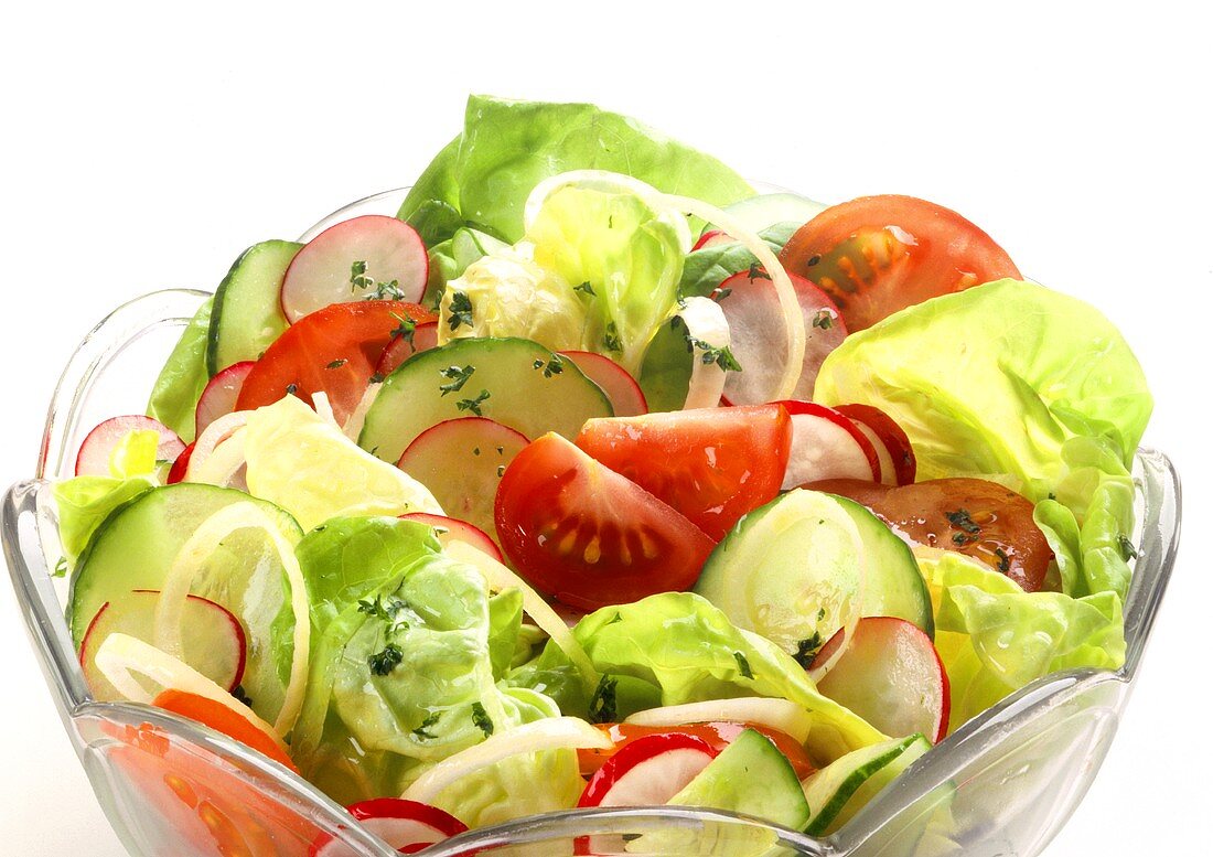 Lettuce with tomatoes, cucumber, radishes