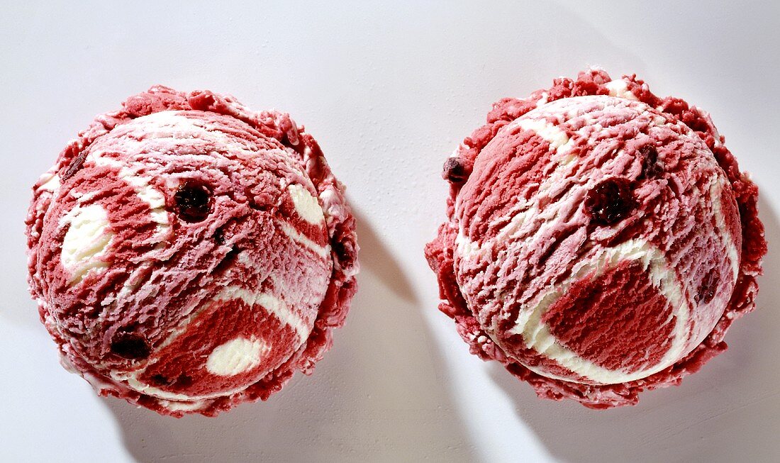 Two scoops of cherry and yoghurt ice cream