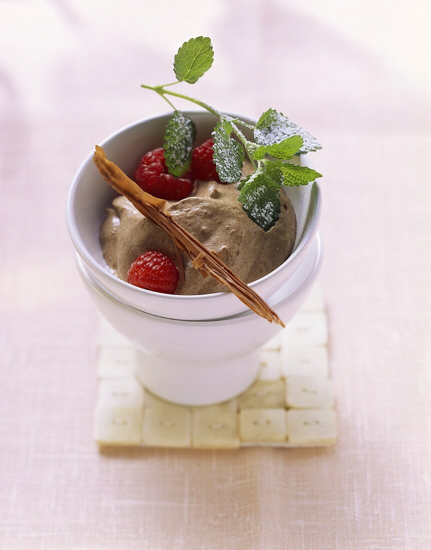 Mousse au chocolat with raspberries and mint