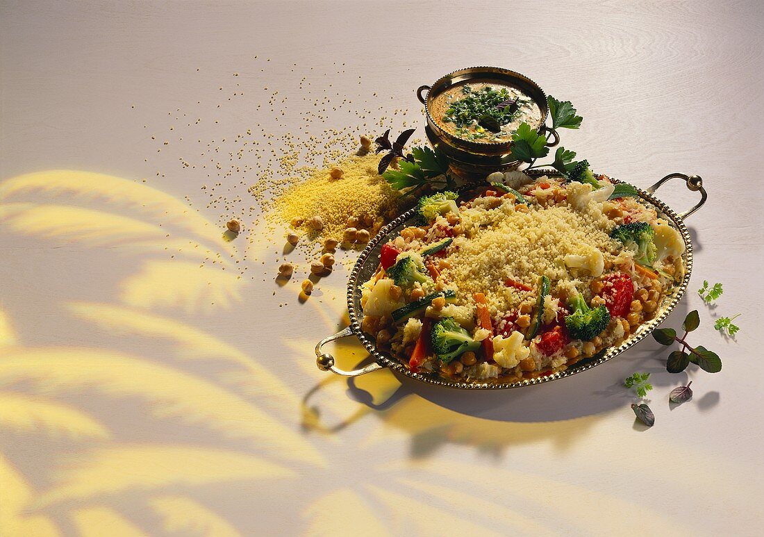 Couscous with vegetables and herb yoghurt sauce