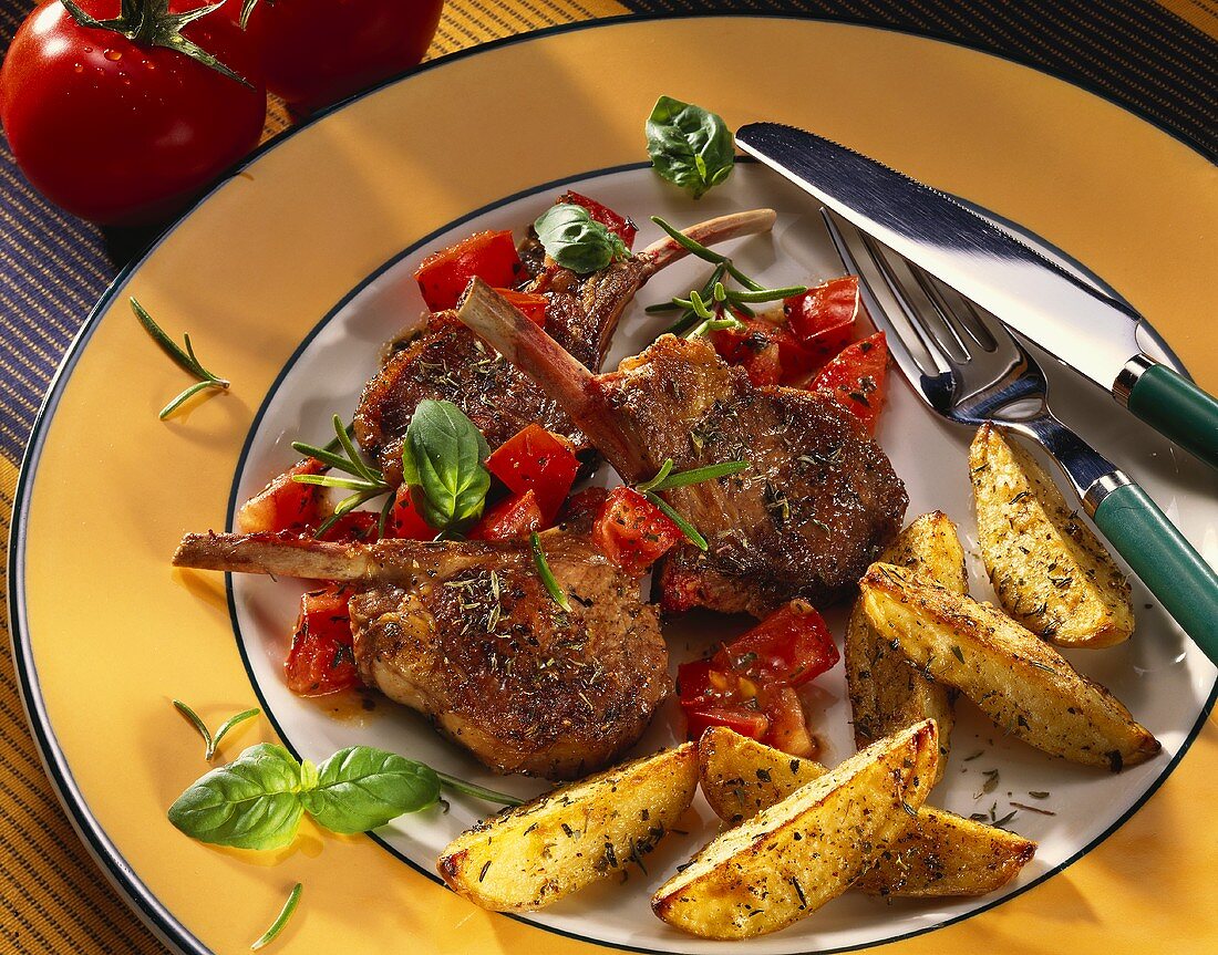 Lamb cutlets with tomatoes and country potatoes