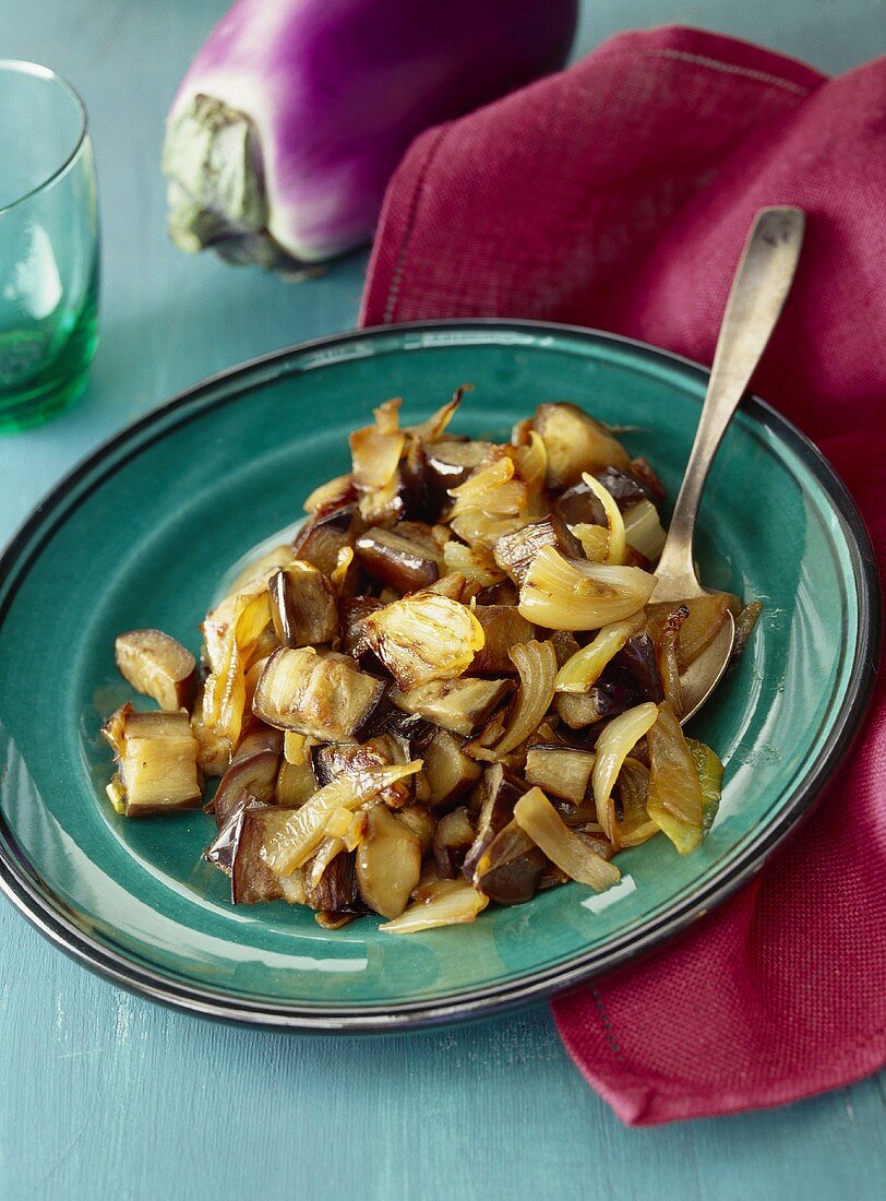 Sweet and sour aubergines with onions