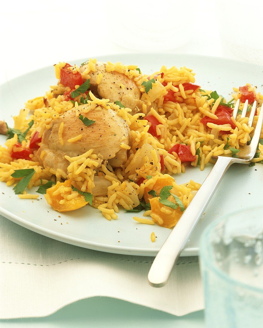 Saffron rice with chicken, peppers and mango