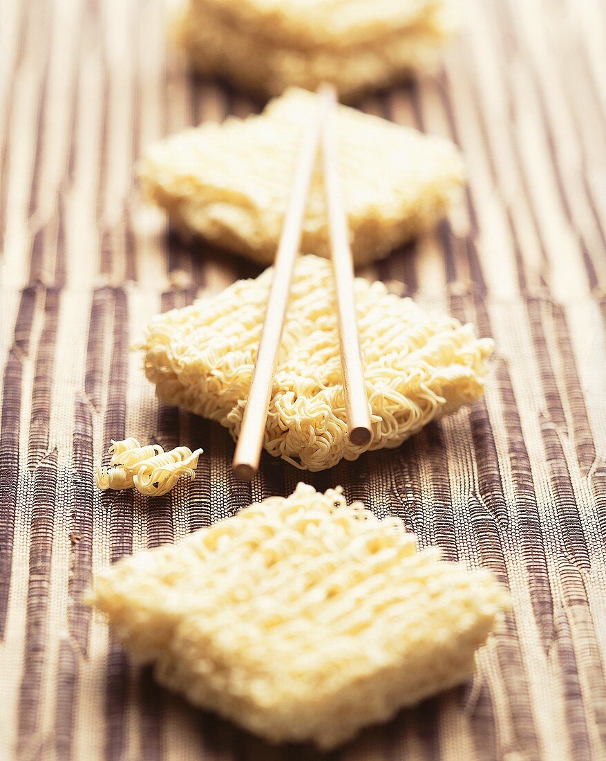 Asian egg noodles with wooden chopsticks