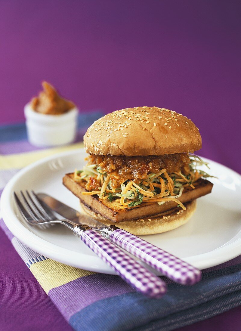 Tofu burger with vegetables and peanut sauce