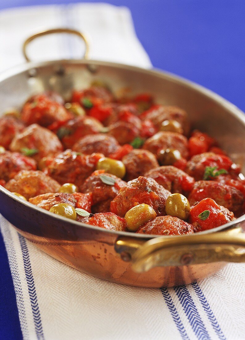 Meatballs with tomatoes and olives from Greece