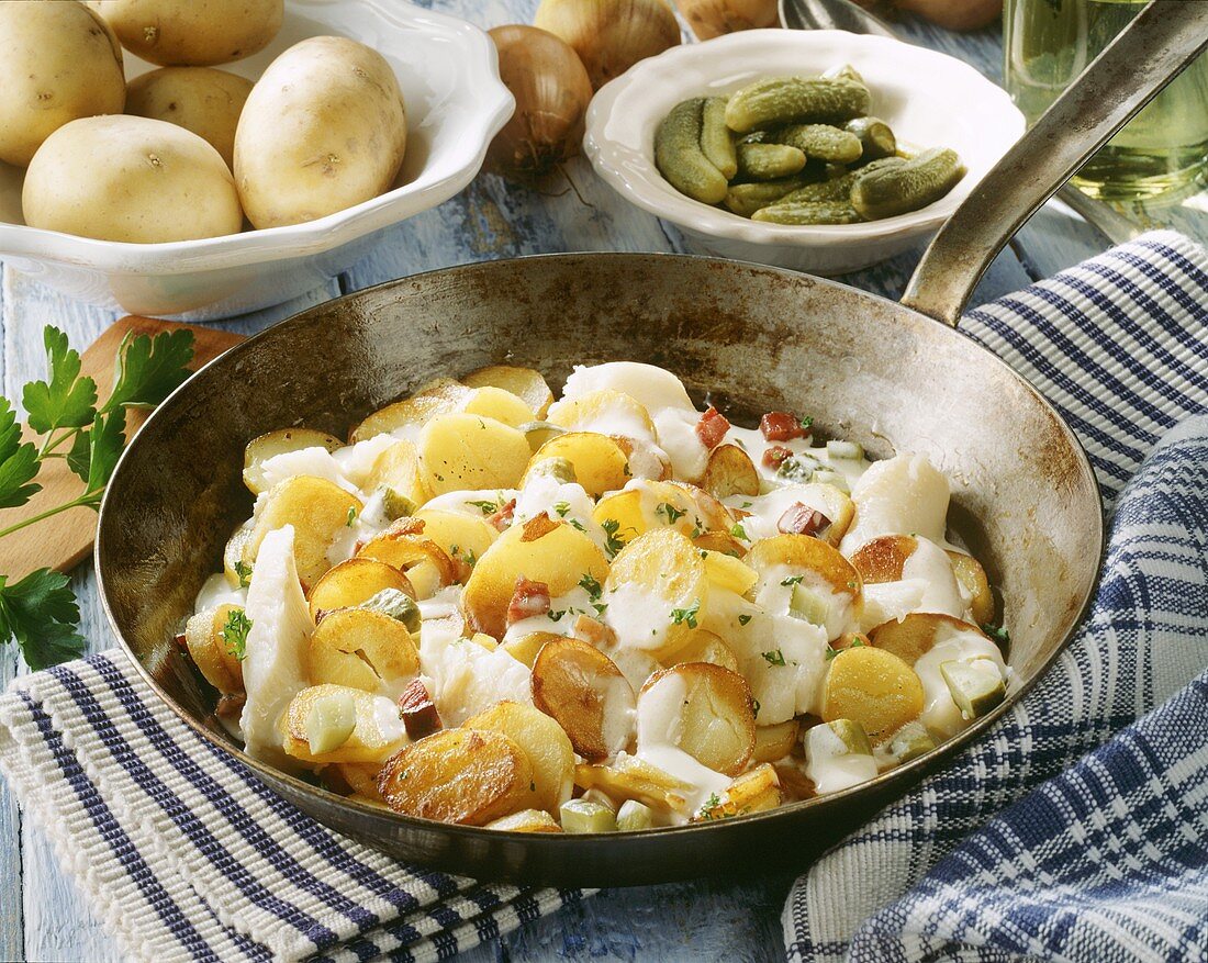 Hamburg Pannfisch (fried fish) with potatoes and bacon