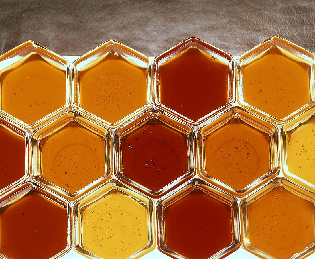 Various honey jars (overhead view)