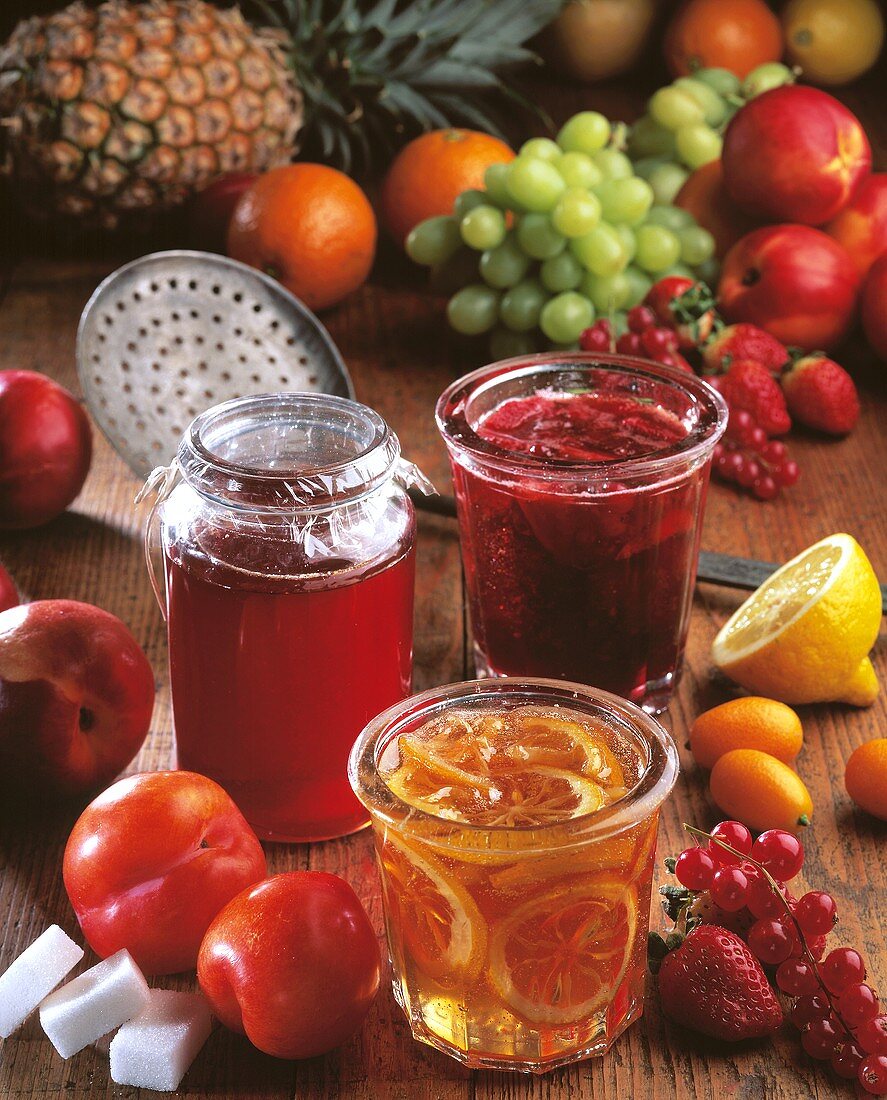 Three jars of jam and fruit 