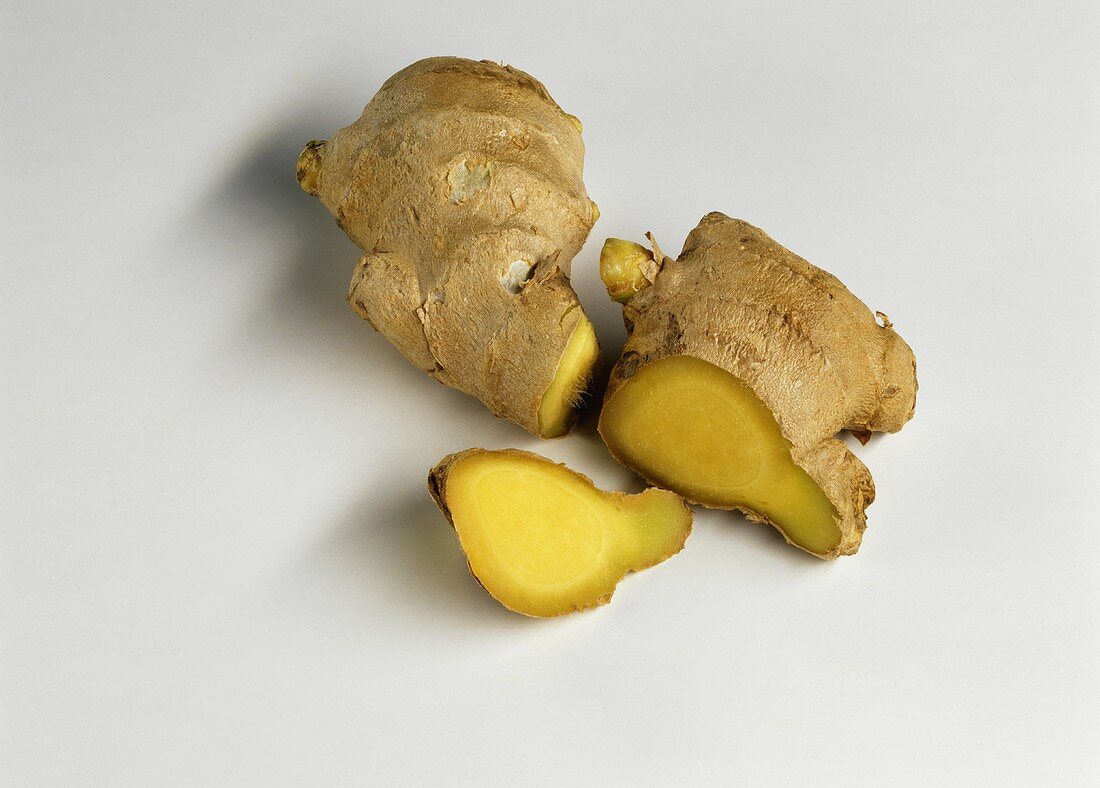 Ginger roots, whole and cut into