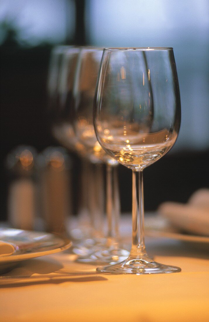 A Table Set with White Wine Glasses