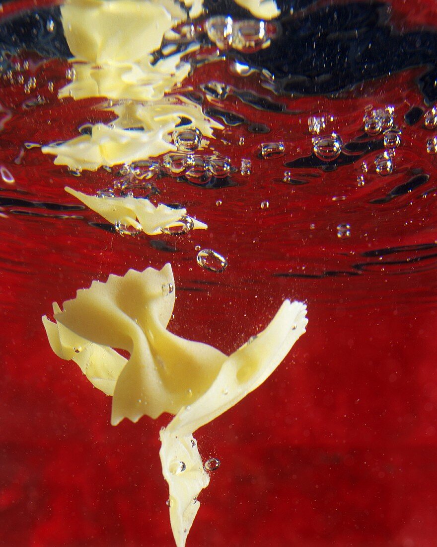 Farfalle Pasta Falling into Water