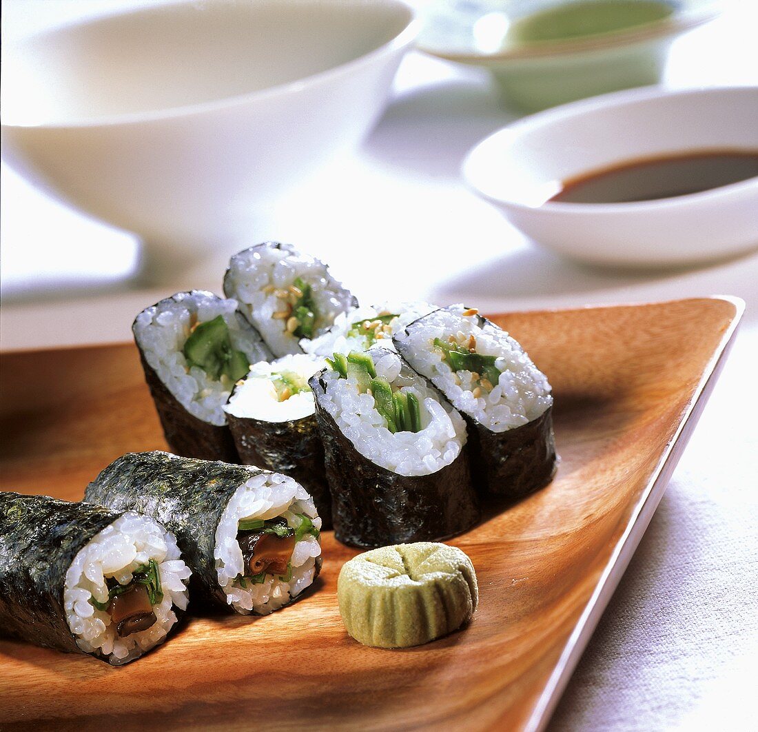 Hosomaki sushi with shiitake mushrooms and with cucumber