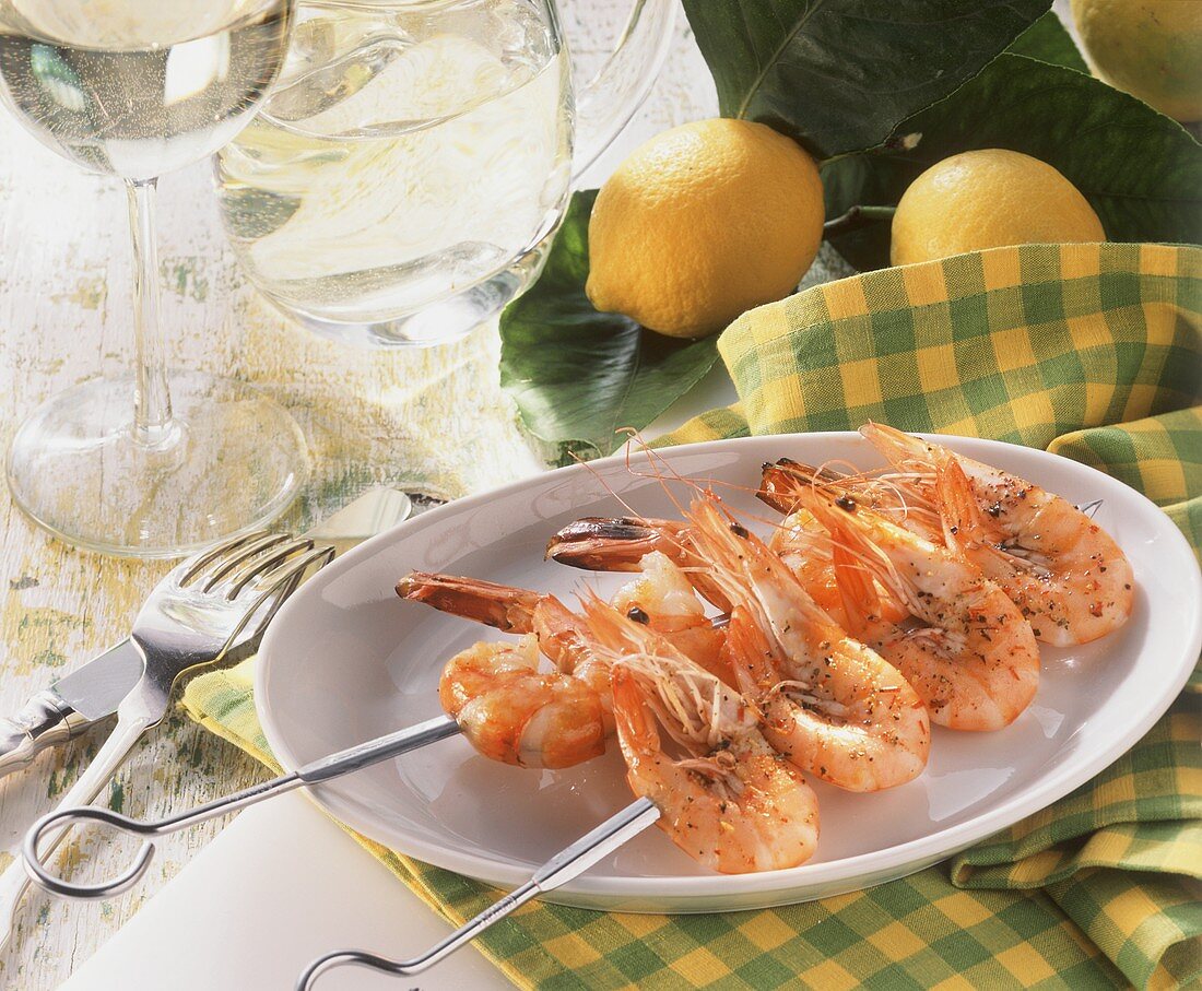 Skewered shrimps on a plate