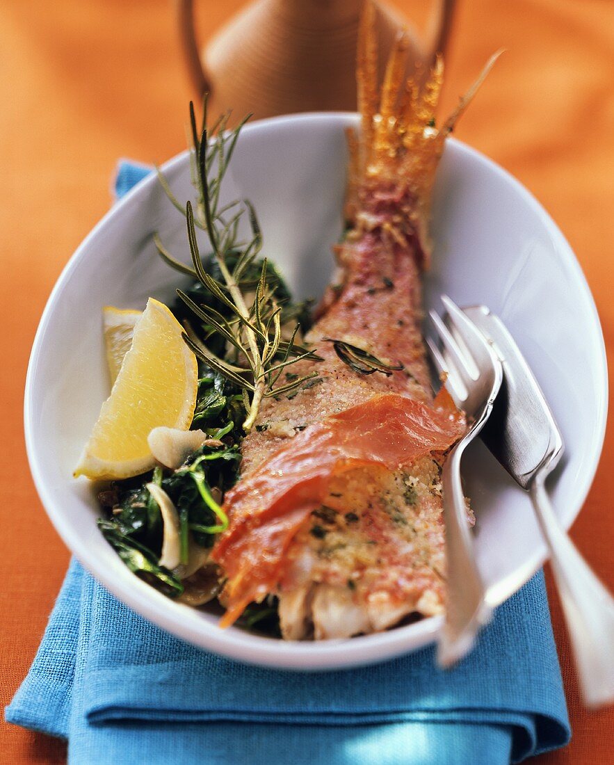 Triglie al forno (Oven-baked red mullet with Parma ham)