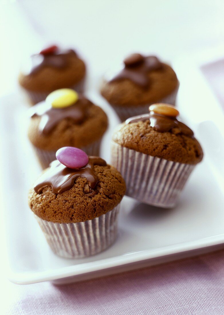 Chocolate muffins with coloured chocolate beans