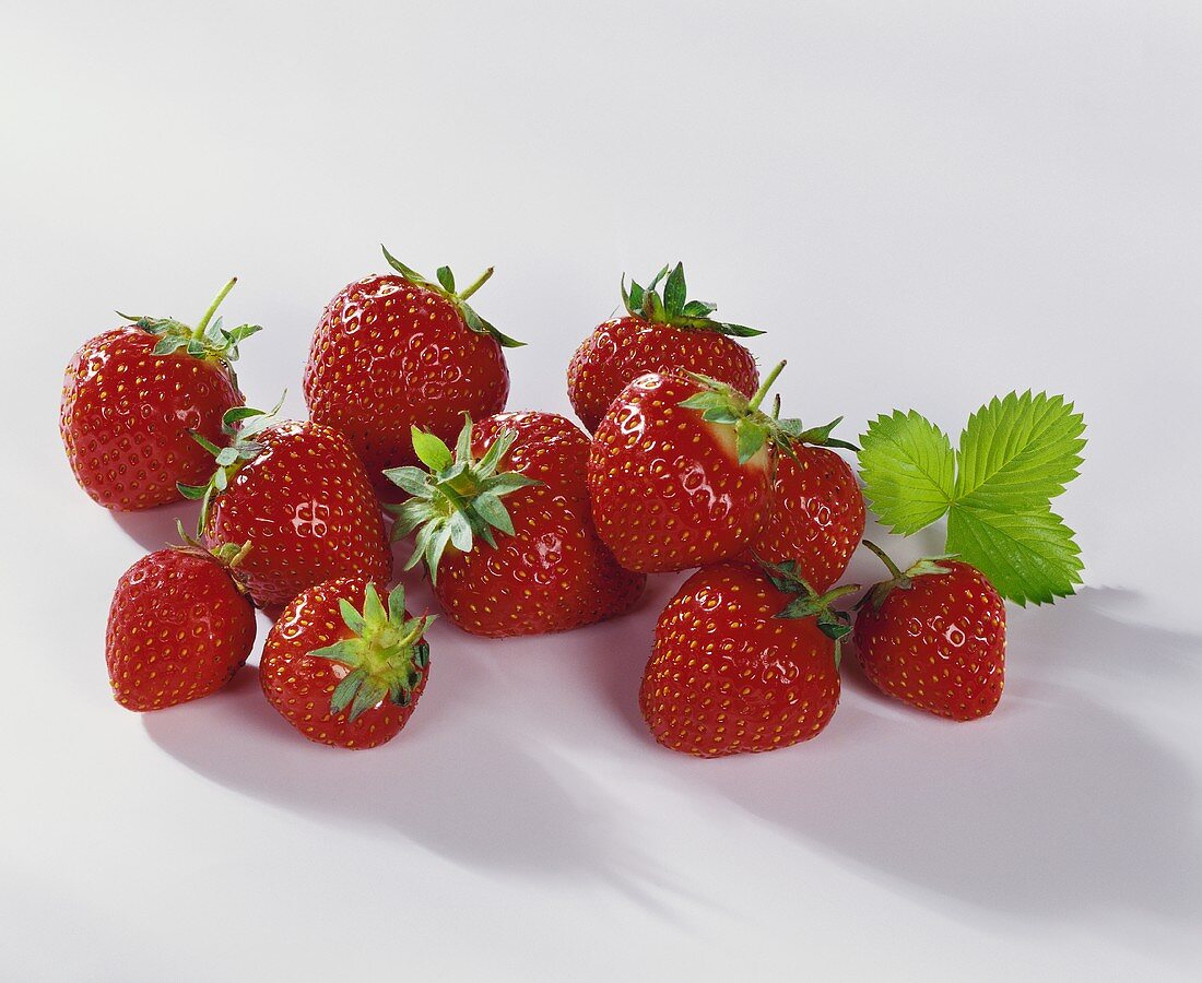Fresh strawberries with a leaf