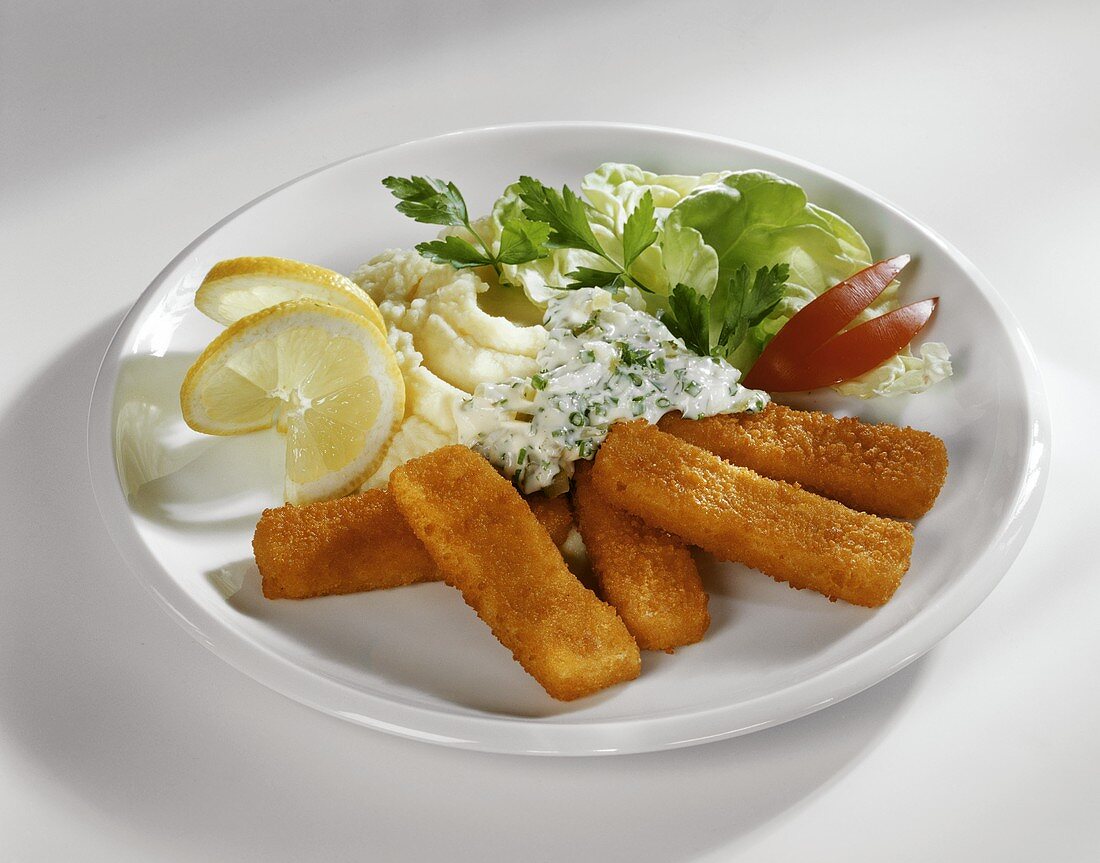 Fish fingers with mashed potato and chive sauce