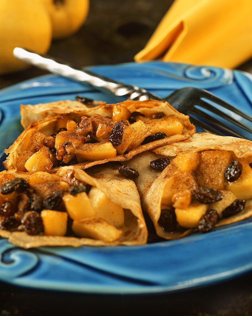 Crepes with apples, nuts and raisins