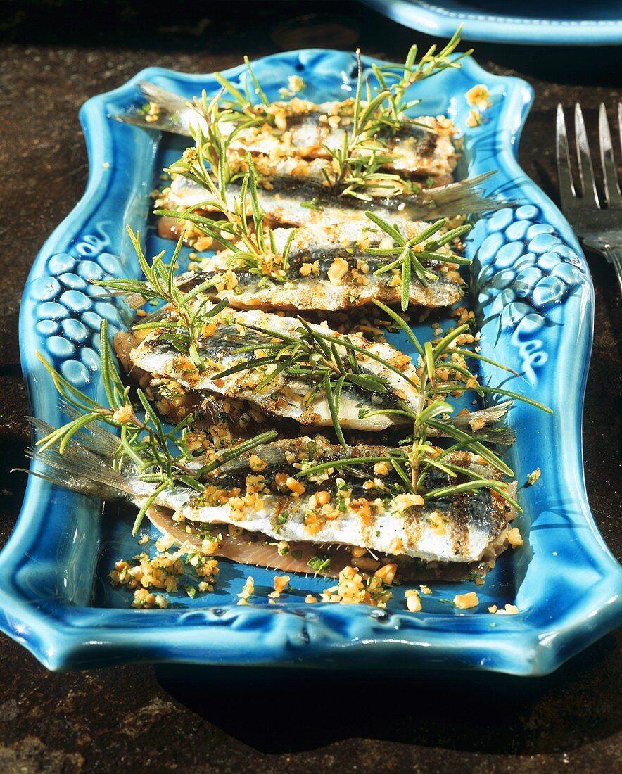 Sardines stuffed with herbs and pine nuts 