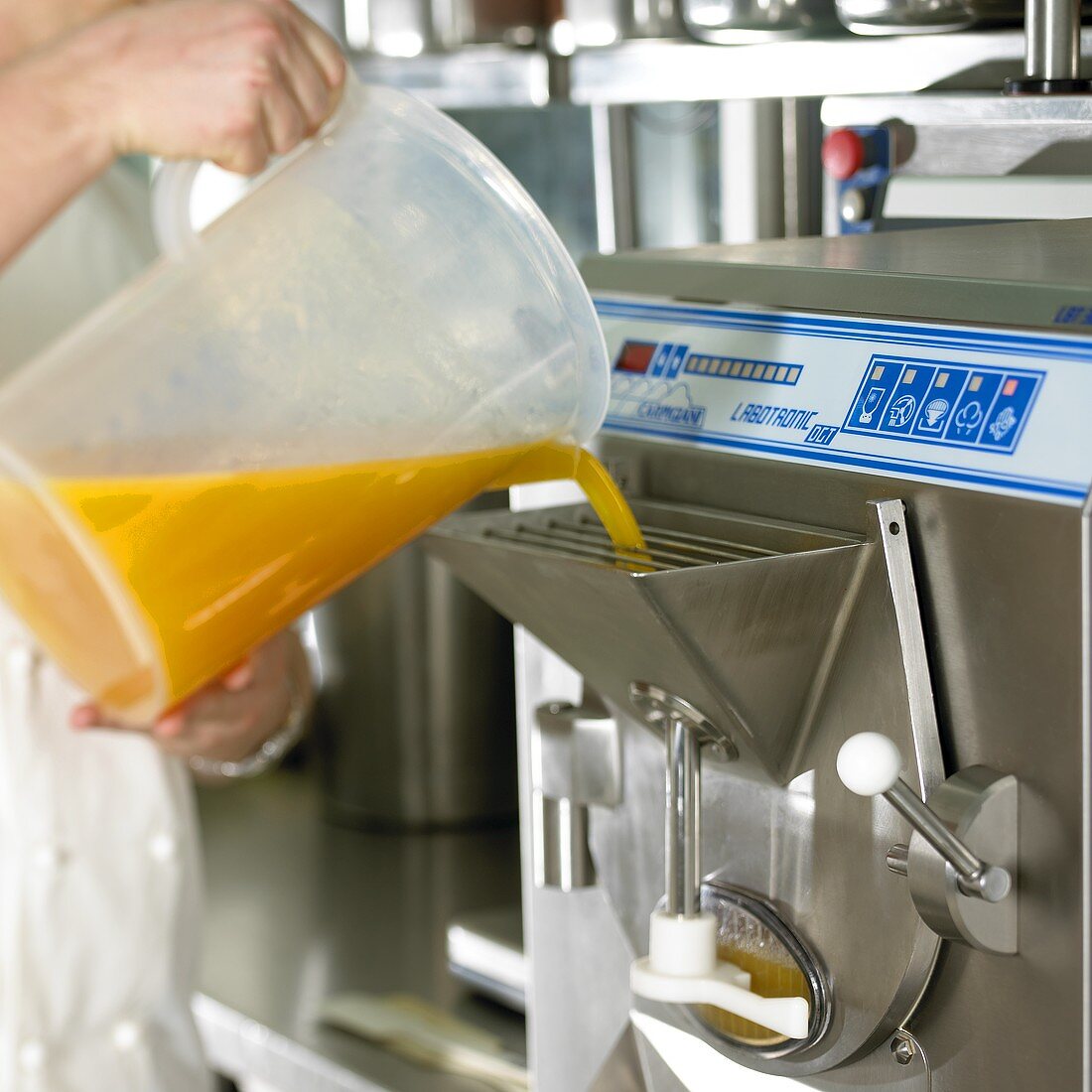 Ice cream making: pouring liquid into ice cream maker