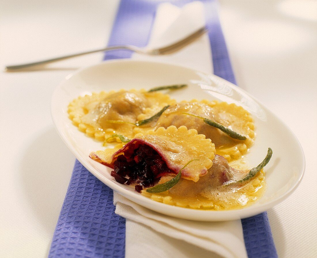 Ravioli with beetroot filling and sage