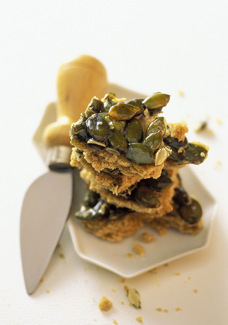 Pumpkin seed biscuits with knife