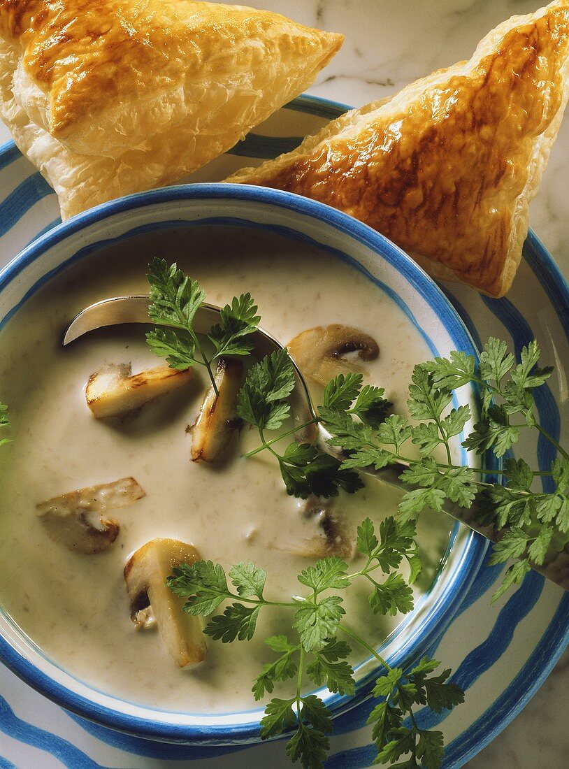 Creamed mushroom soup with chervil, with puff pastry triangles