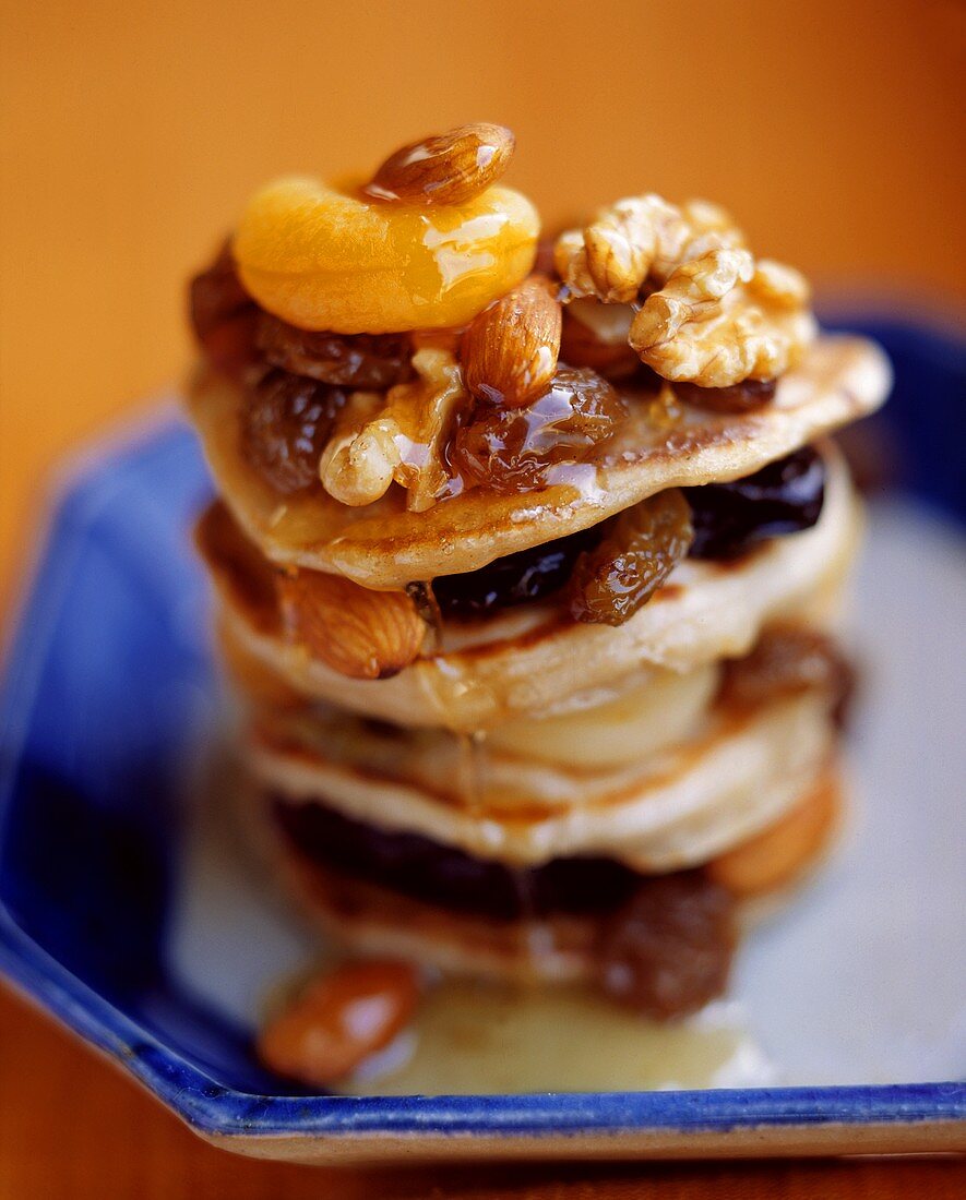 Layered pancakes with nuts and fruit