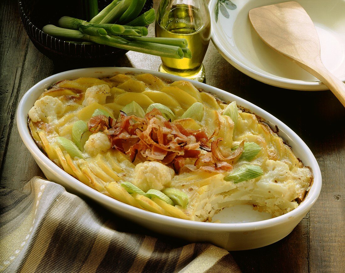 Potato casserole with vegetables and bacon