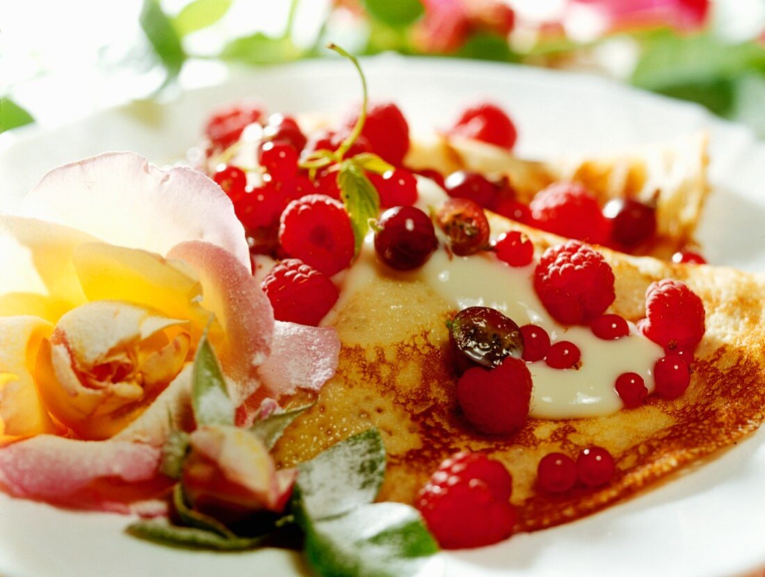 Pancake with berries and vanilla mousse