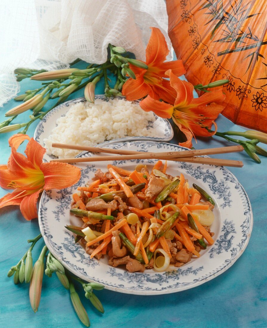 Chicken breast with vegetable strips and day lilies