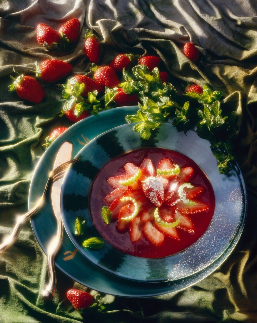 Fresh strawberries on strawberry blancmange