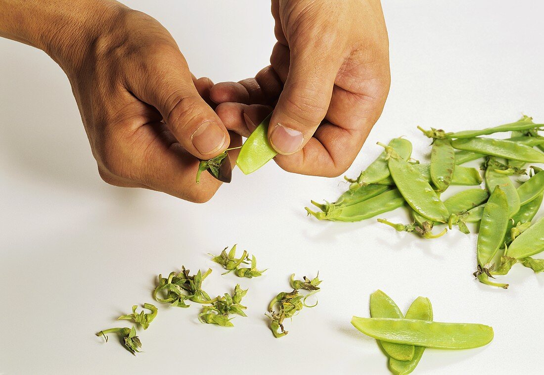 Opening a mangetout pea