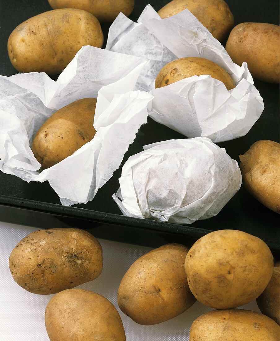 New potatoes in baking paper