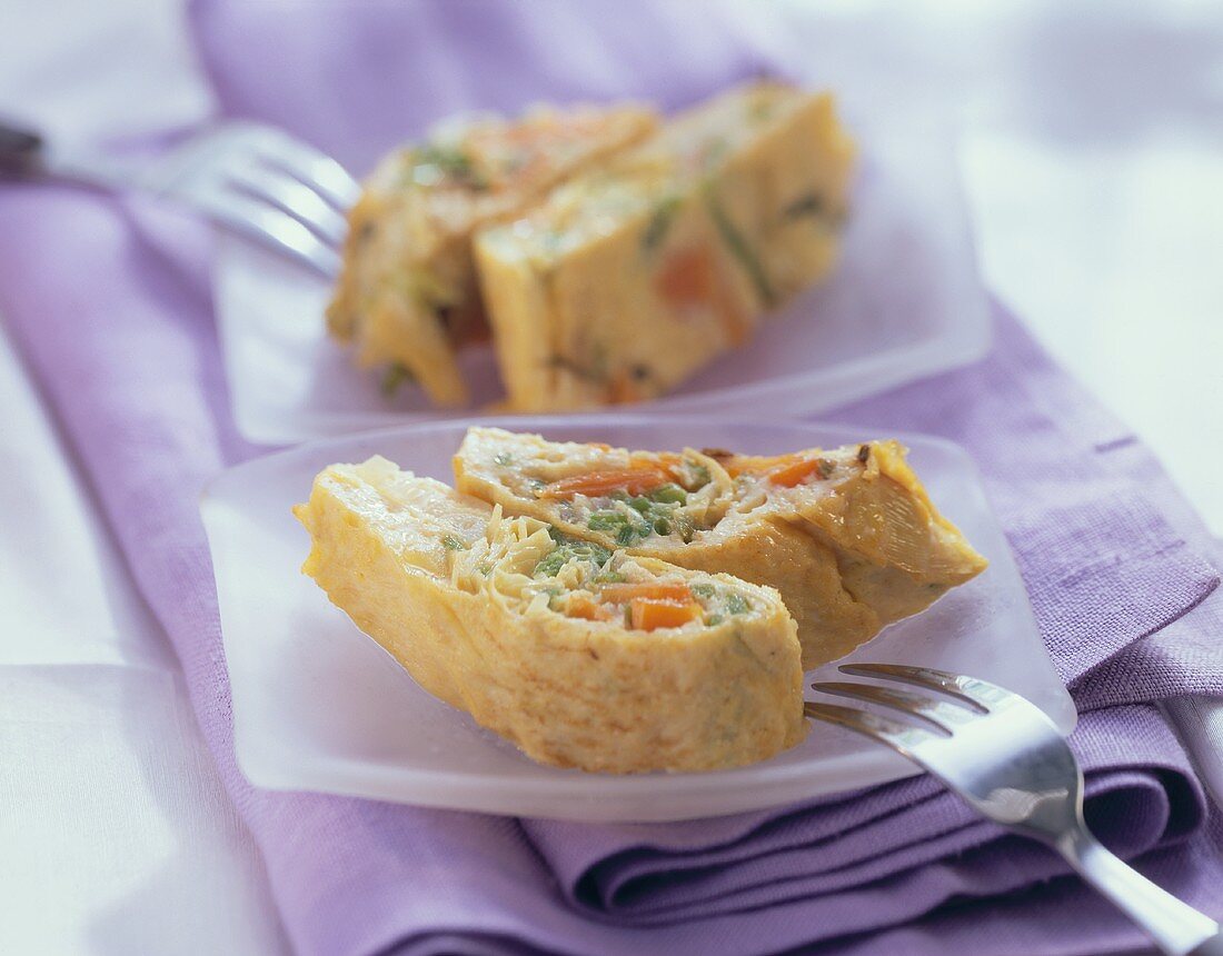 Omelette roll with vegetable filling