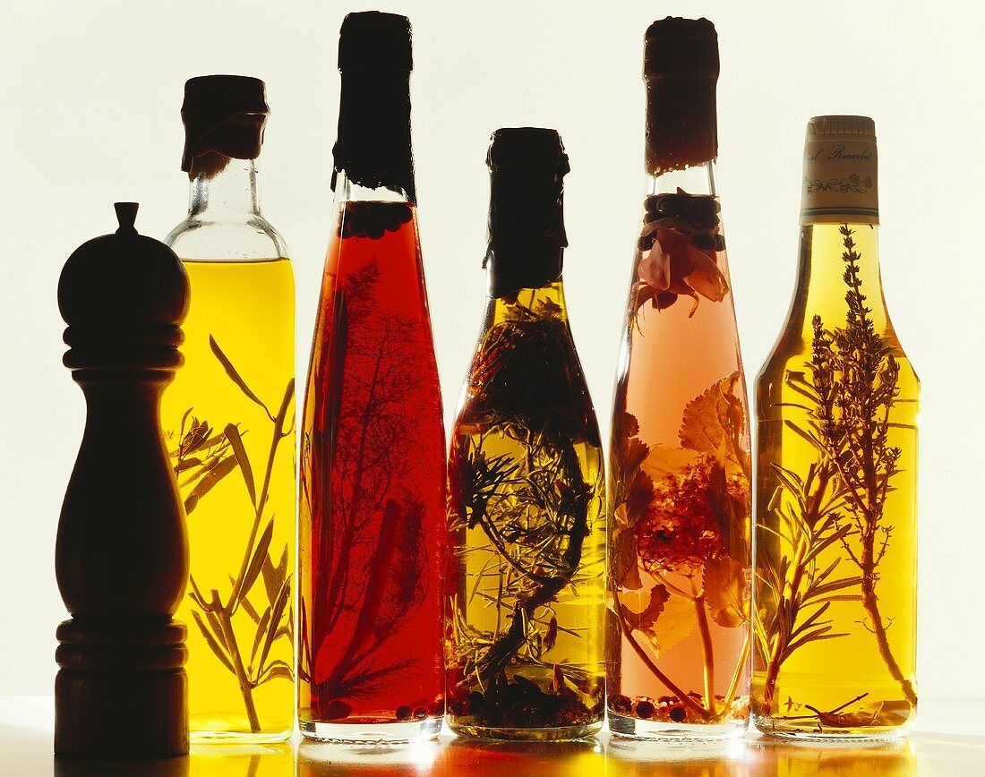 Various types of herb oil and vinegar in bottles