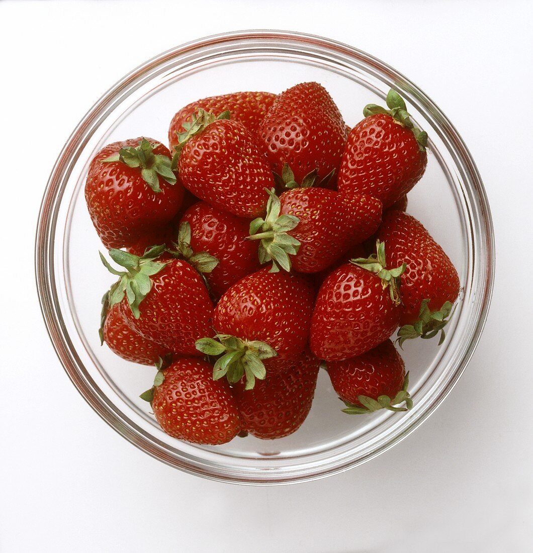 Fresh strawberries in glass bowl