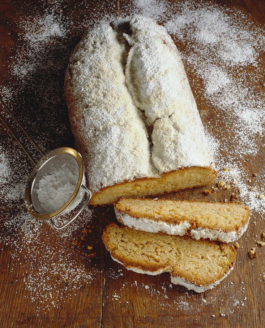 Almond stollen with icing sugar