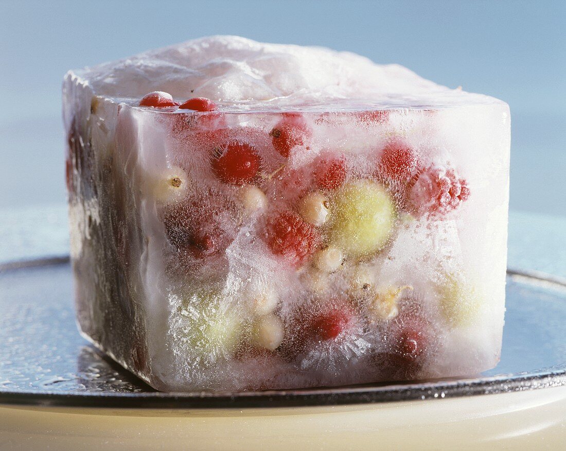 Frozen fruit in a block of ice