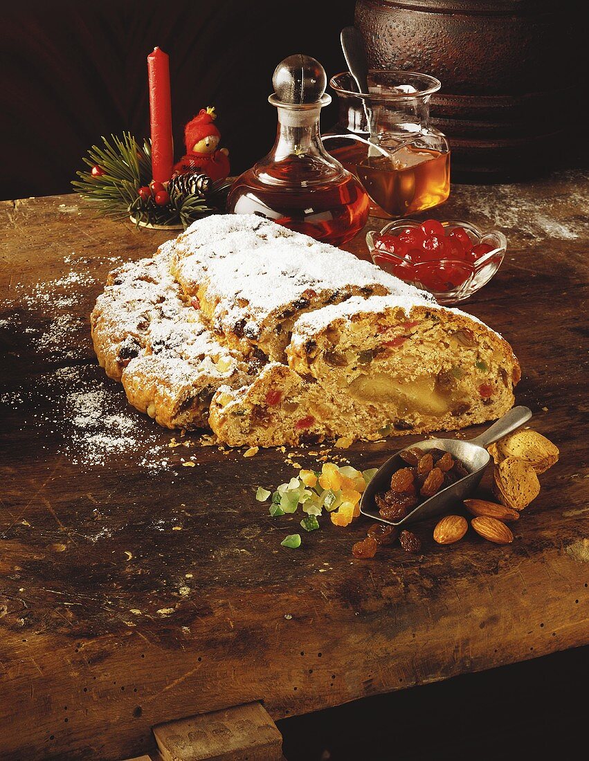 Christmas stollen with candied peel, a slice cut