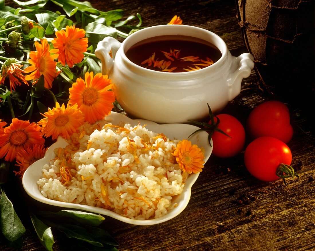 Risotto with marigolds and cold tomato soup with marigolds
