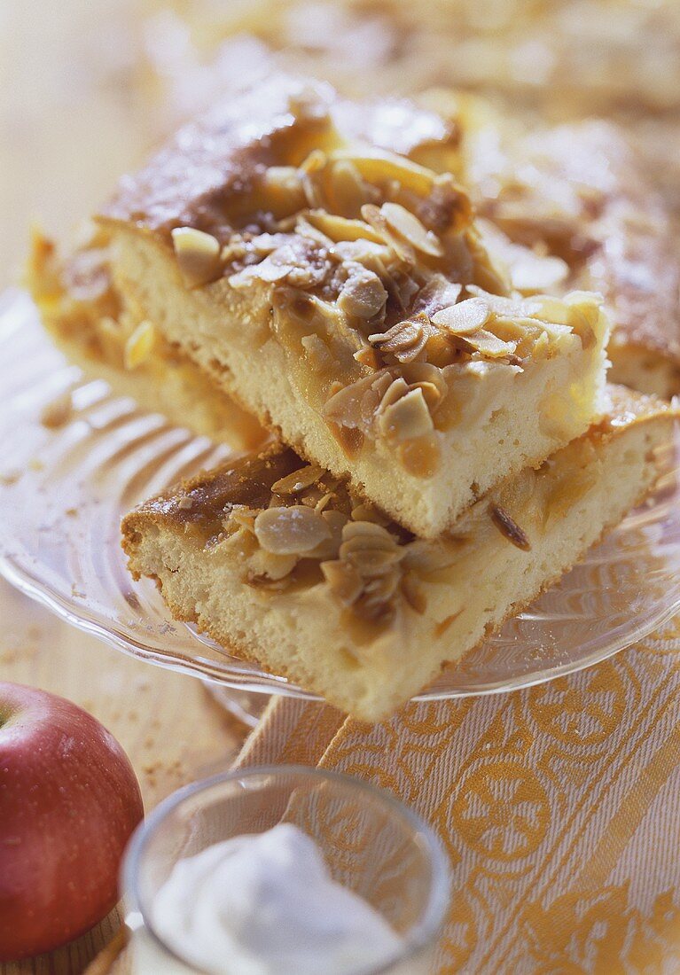 Apple cake with flaked almonds, in slices