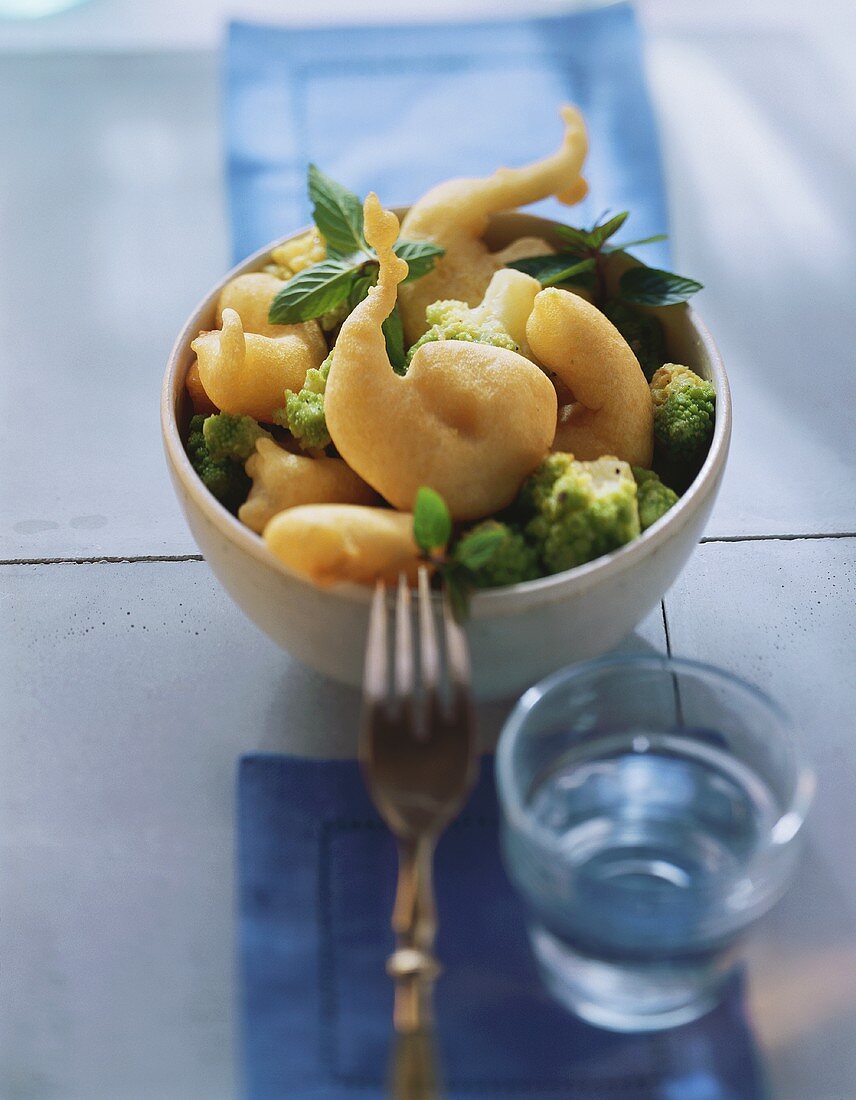 Deep-fried scampi on romanesco salad