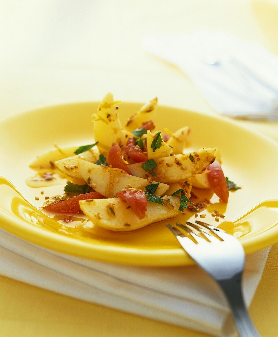 Potato and sesame salad with tomatoes