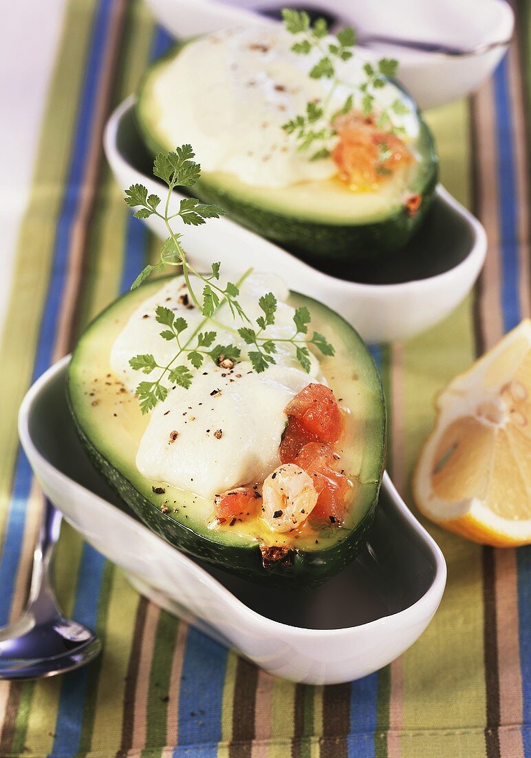 Avocados stuffed with lemon quark, tomatoes and shrimps