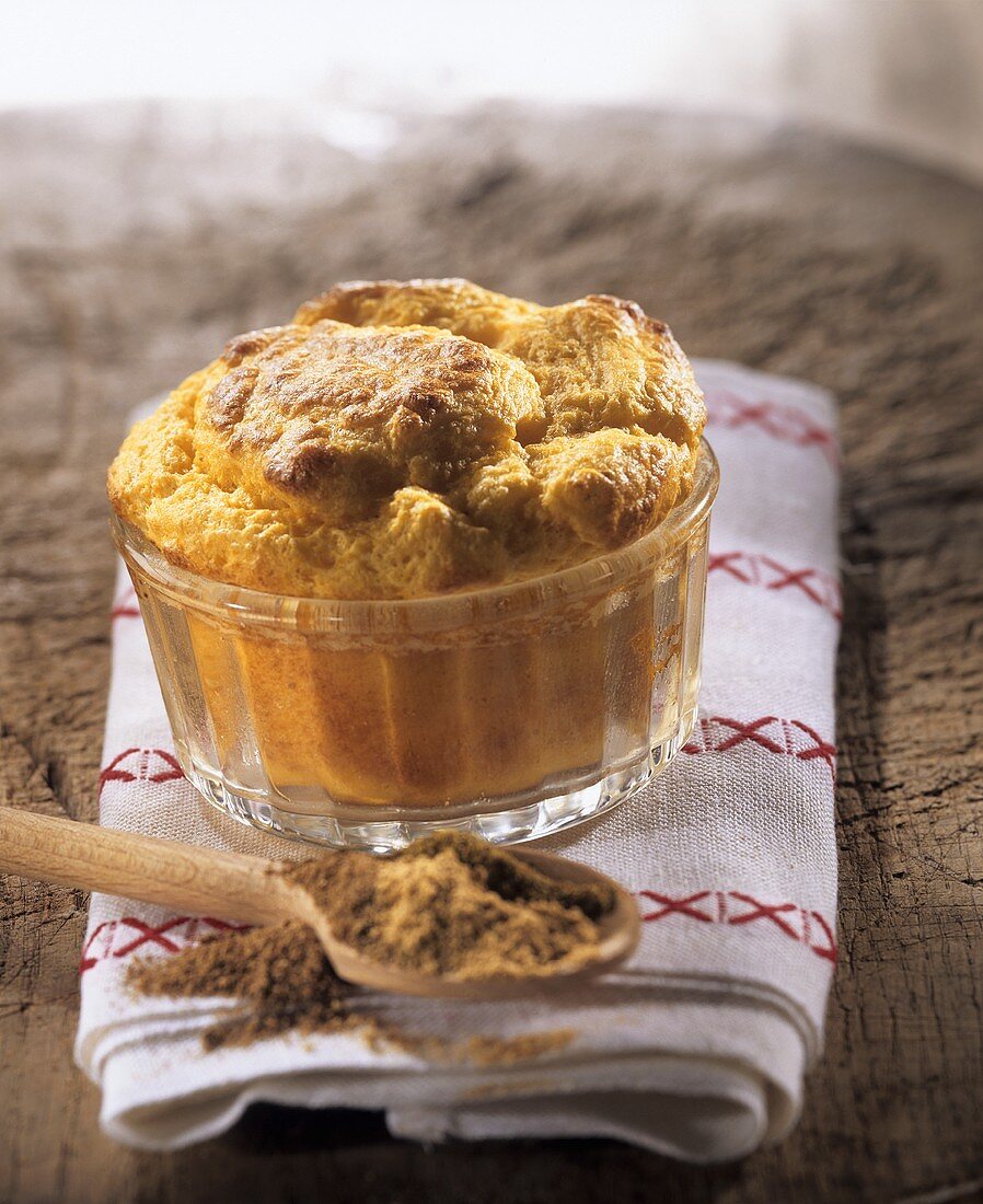 Spiced carrot soufflé in glass baking dish