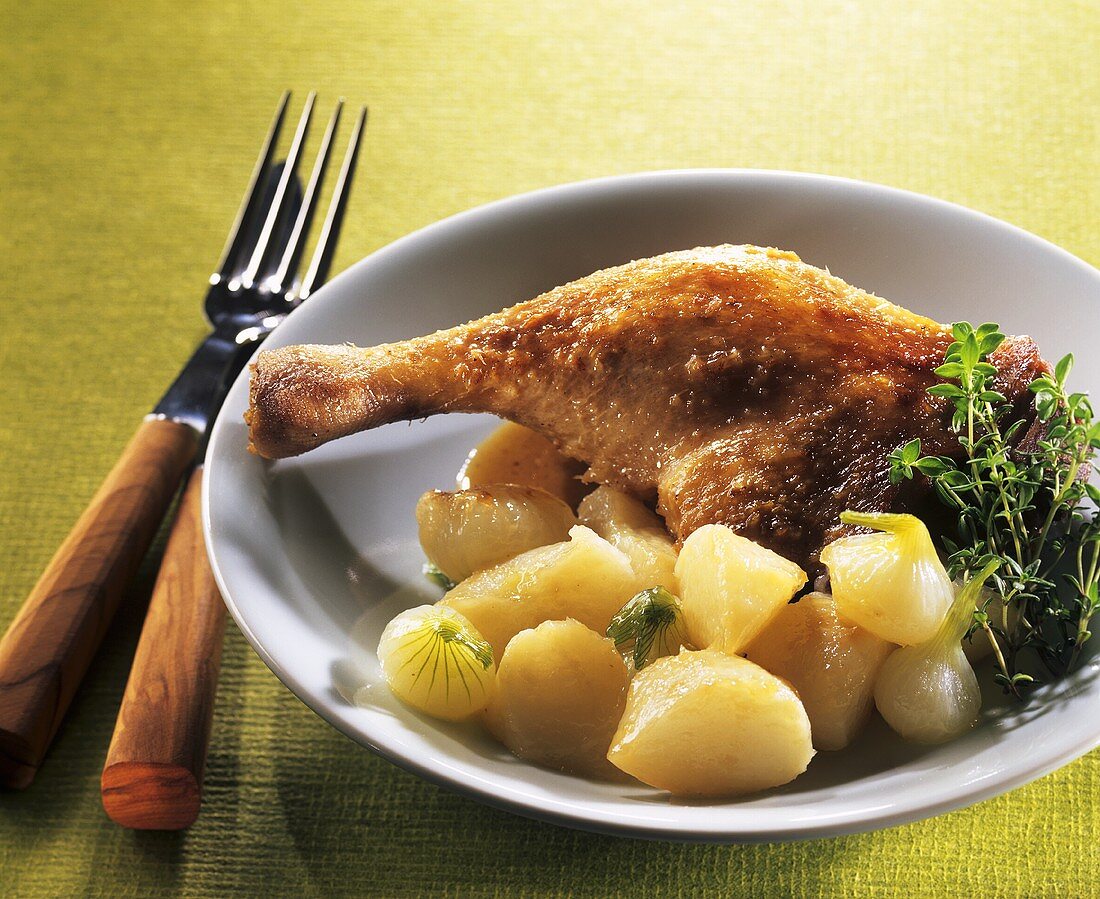 Roast duck leg with white turnips